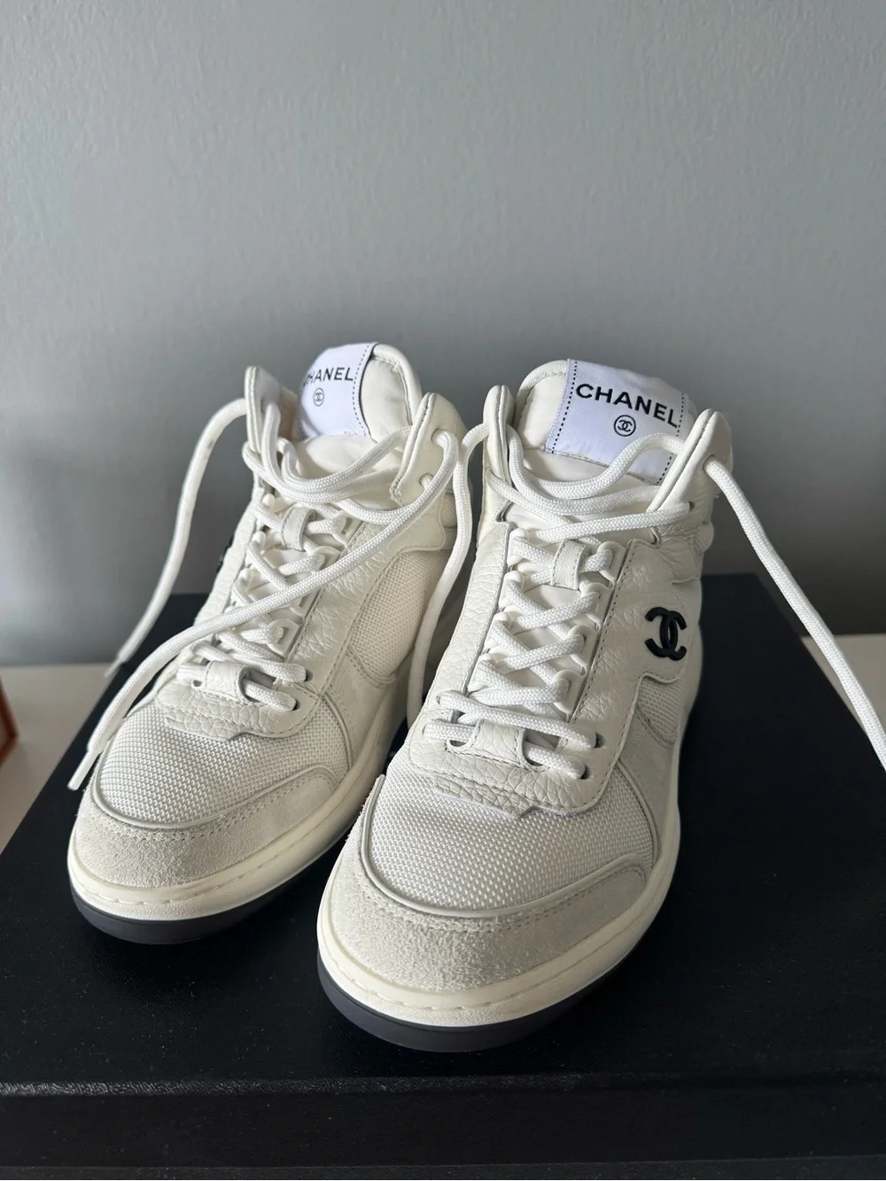 CHANEL White and Black High-Top Sneakers